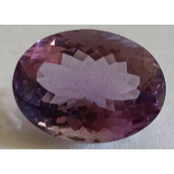 Améthyste naturelle taille ovale a facettes 19.97x14.99x10.09 mm 17.00 carats avec certificat 2