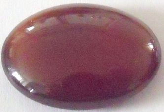 Grenat hessonite ovale cabochon 20x15 mm 16.00 carats