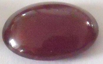 Grenat hessonite taille ovale cabochon 16x12 mm 13.30 carats