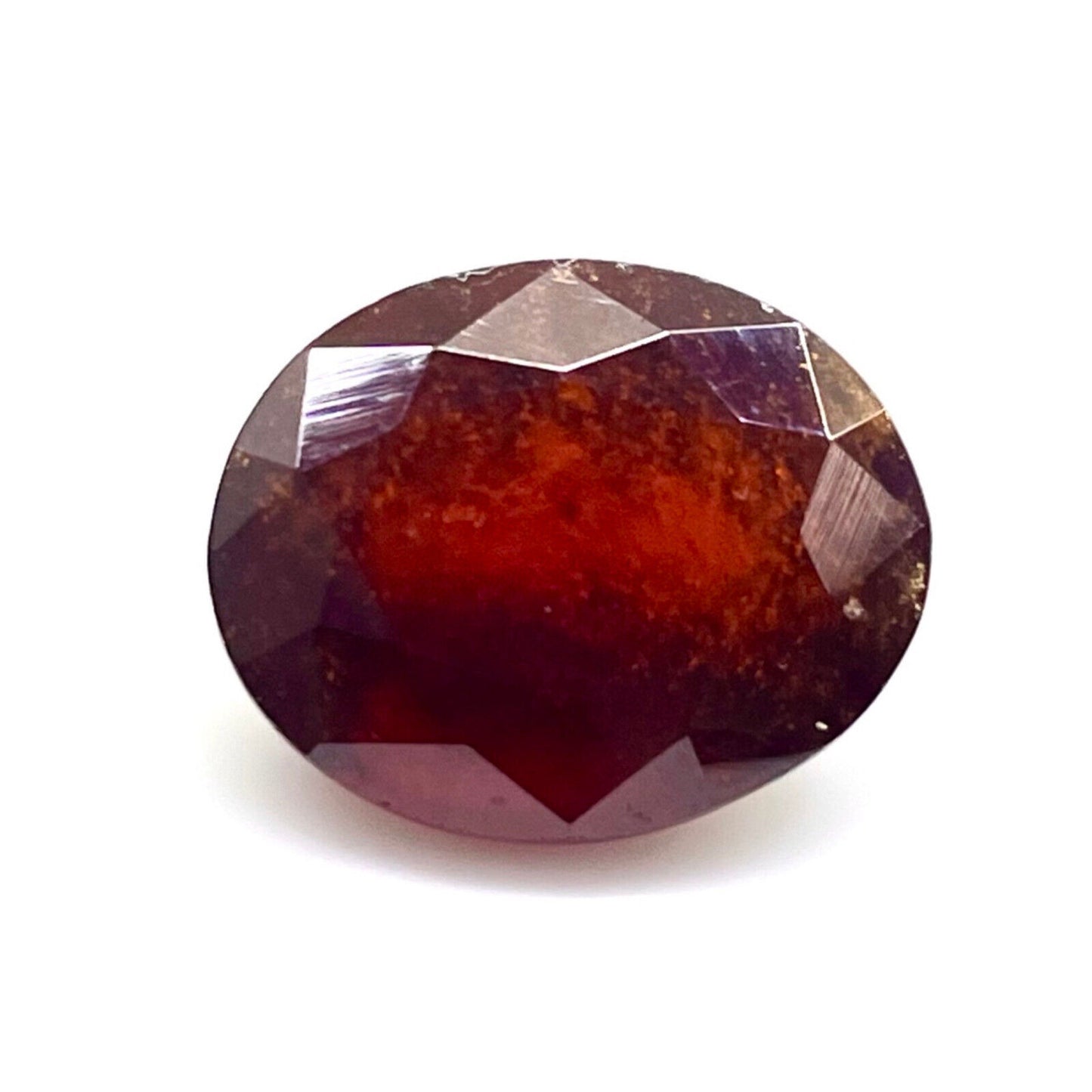 Grenat hessonite ovale a facettes 14x11x8 mm  9.60 carats