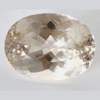 Topaze champagne ovale a facettes 6x4 mm 0.47 carat