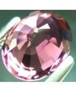 Tourmaline rose ou rubellite ovale a facettes 5x3 mm 0.24 carat