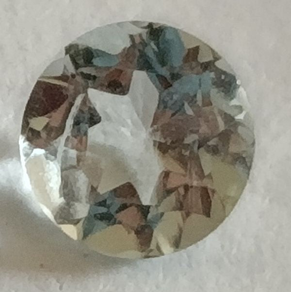 Aigue marine ronde a facettes 4 mm 0.20 carat