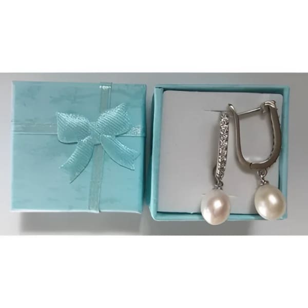 Belles boucles d'oreilles en argent et perles de culture blanches véritables
