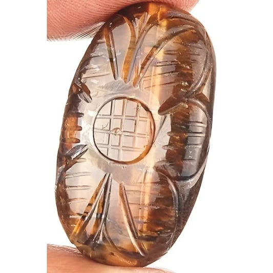 Oeil de tigre ovale sculpté 35.2x21.6x8.2 mm 55.35 carats