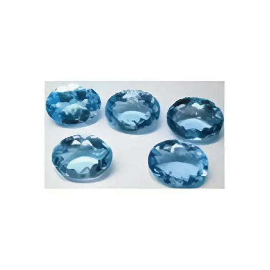 Topaze bleu ciel ovale a facettes 16x12 mm 11.60 carats