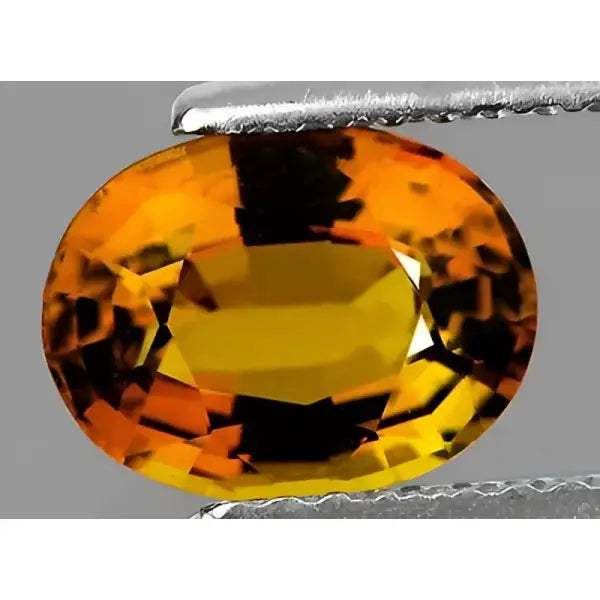 Tourmaline jaune or ovale a facettes 7.96x5.82x 3.43 mm 1.15 carat