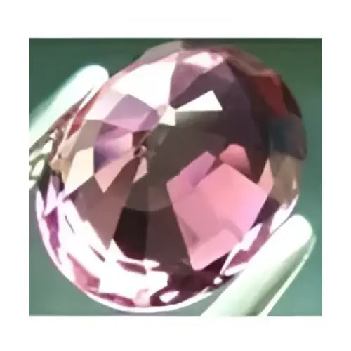 Tourmaline rose ou rubellite ovale a facettes 5x3 mm 0.24 carat