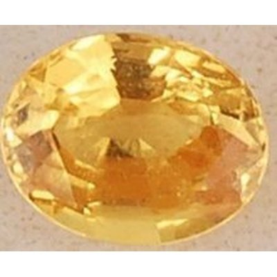 Saphir jaune ovale a facettes 7.3x5.8x3.3 mm 1.25 carat