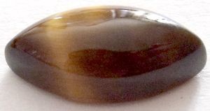 Oeil de tigre marquise cabochon 14x7 mm 3.00 carats