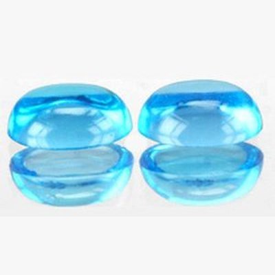 Topaze bleu suisse ovale cabochon 8x6 mm 1.50 carat