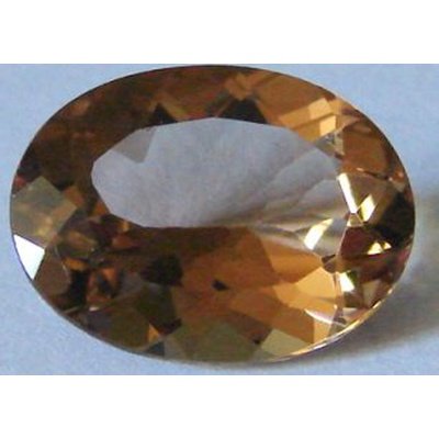 Topaze champagne ovale a facettes 16x12 mm 10.50 carats