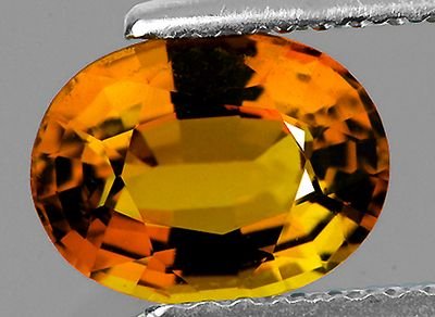 Tourmaline jaune or ovale a facettes 7.96x5.82x 3.43 mm 1.15 carat