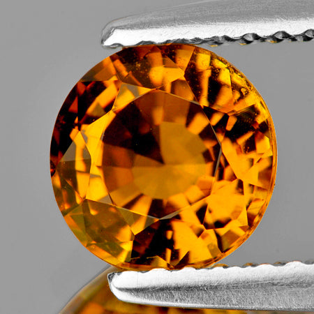 Tourmaline jaune or ronde a facettes 4.93x3.33 mm 0.73 carat