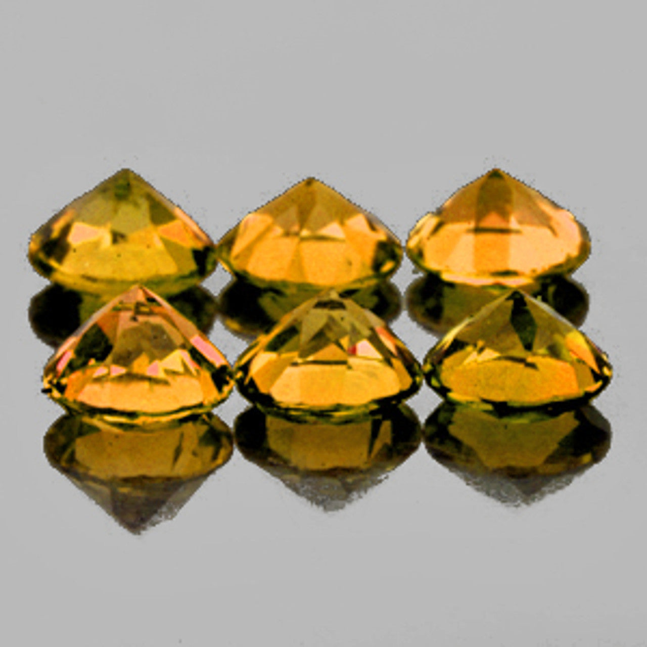 Tourmaline jaune or ronde a facettes 4 mm 0.30 carat