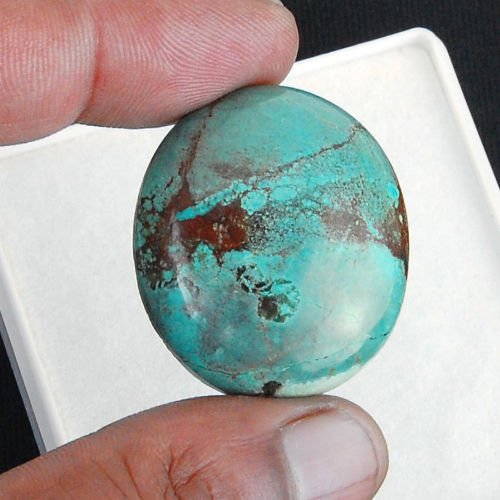 Turquoise taille ovale cabochon 33x29x9 mm 59.00 carats