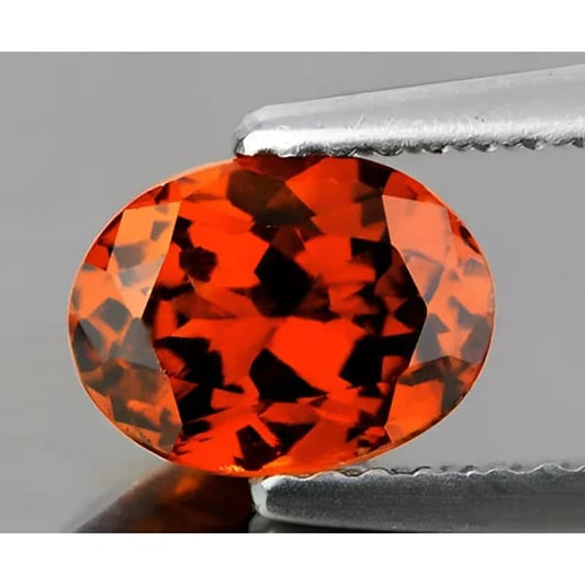 Grenat hessonite ovale a facettes 6x4 mm 0.53 carat