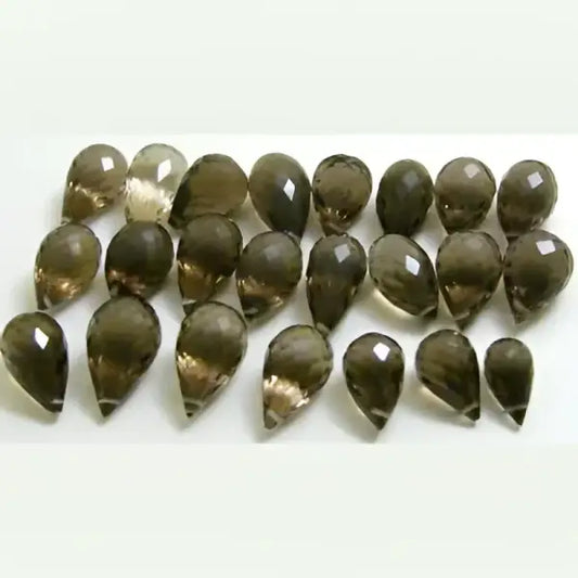 Lot de 40 pierres 139.00 carats de quartz fumé tailles biriolettes percées