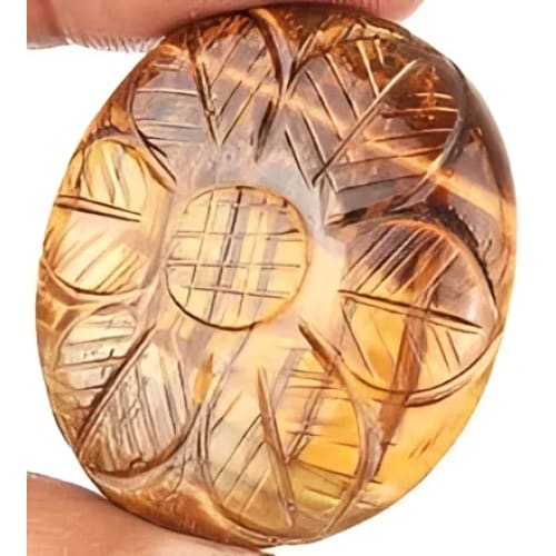 Oeil de tigre ovale sculpté 36.3x32.5x8 mm 83.25 carats