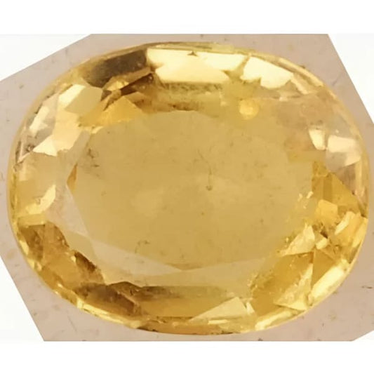 Saphir jaune naturel ovale a facettes 7x5.7x3 mm 1.24 carat