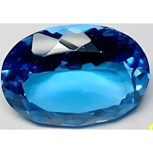 Topaze bleu suisse ovale a facettes 18x13 mm 15.00 carats