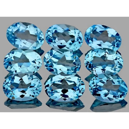 Topaze bleu suisse ovale a facettes 6x4 mm 0.56 carat