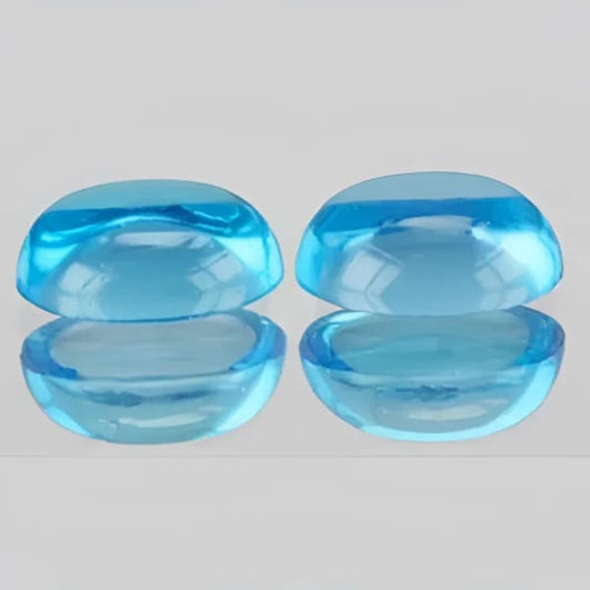 Topaze bleu suisse ovale cabochon 7x5 mm 1.20 carat