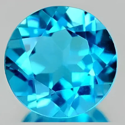 Topaze bleu suisse ronde a facettes 12 mm 7.00 carats