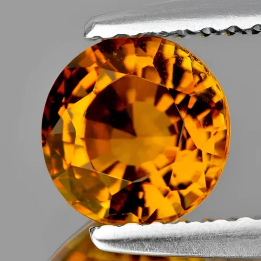Tourmaline jaune or ronde a facettes 4.93x3.33 mm 0.73 carat