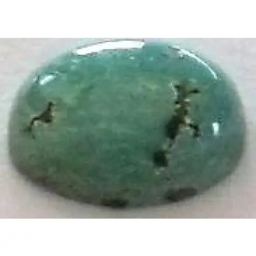 Turquoise taille ovale cabochon 8x6 mm 1.15 carats