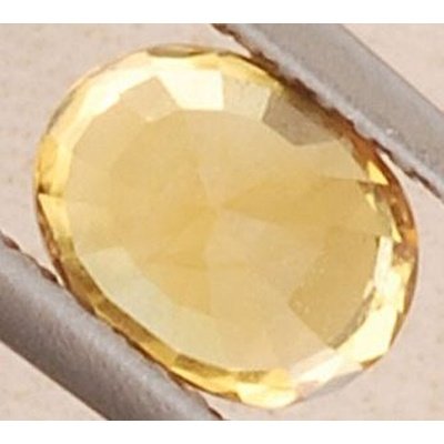 Saphir jaune naturel ovale a facettes 7x5x4 mm 1.68 carat